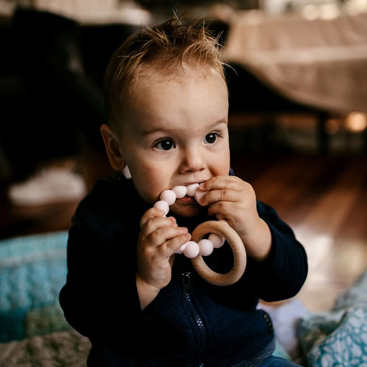 Baby with Wooden Teething Toy