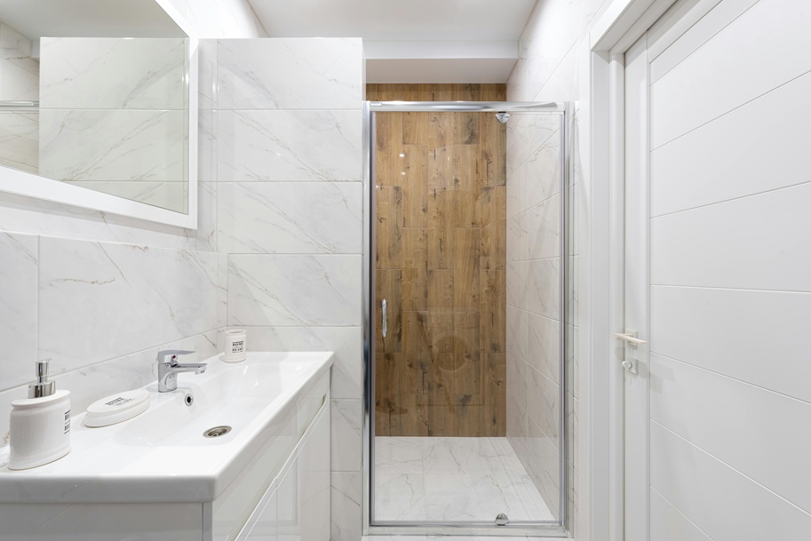 bathroom with a shower panel