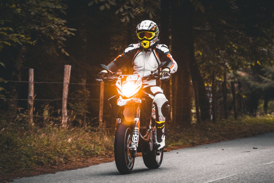 man driving a motorcycle with a quality gear