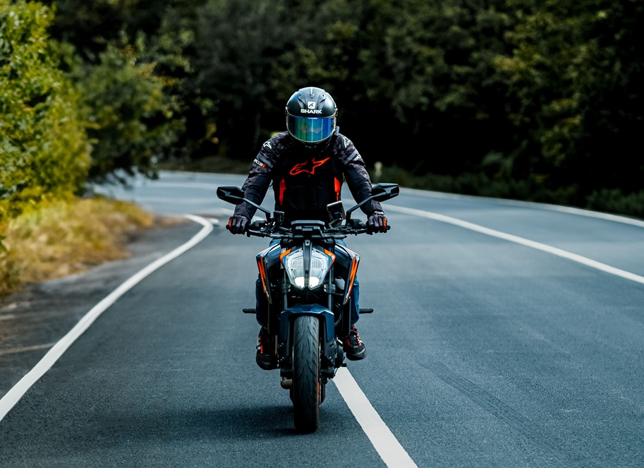 man driving motorcycle
