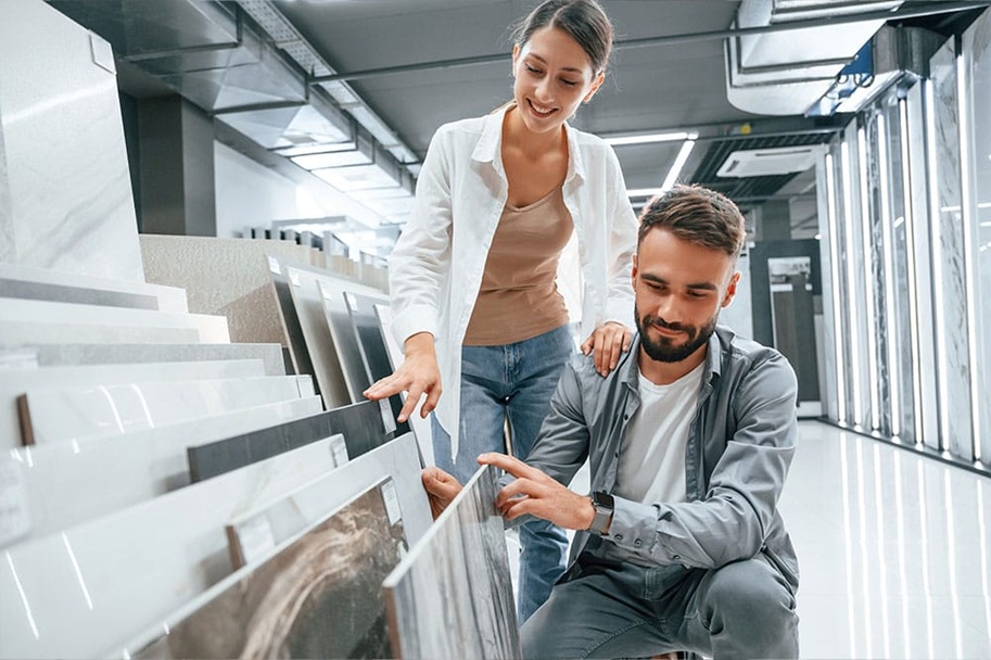couple choosing tiles