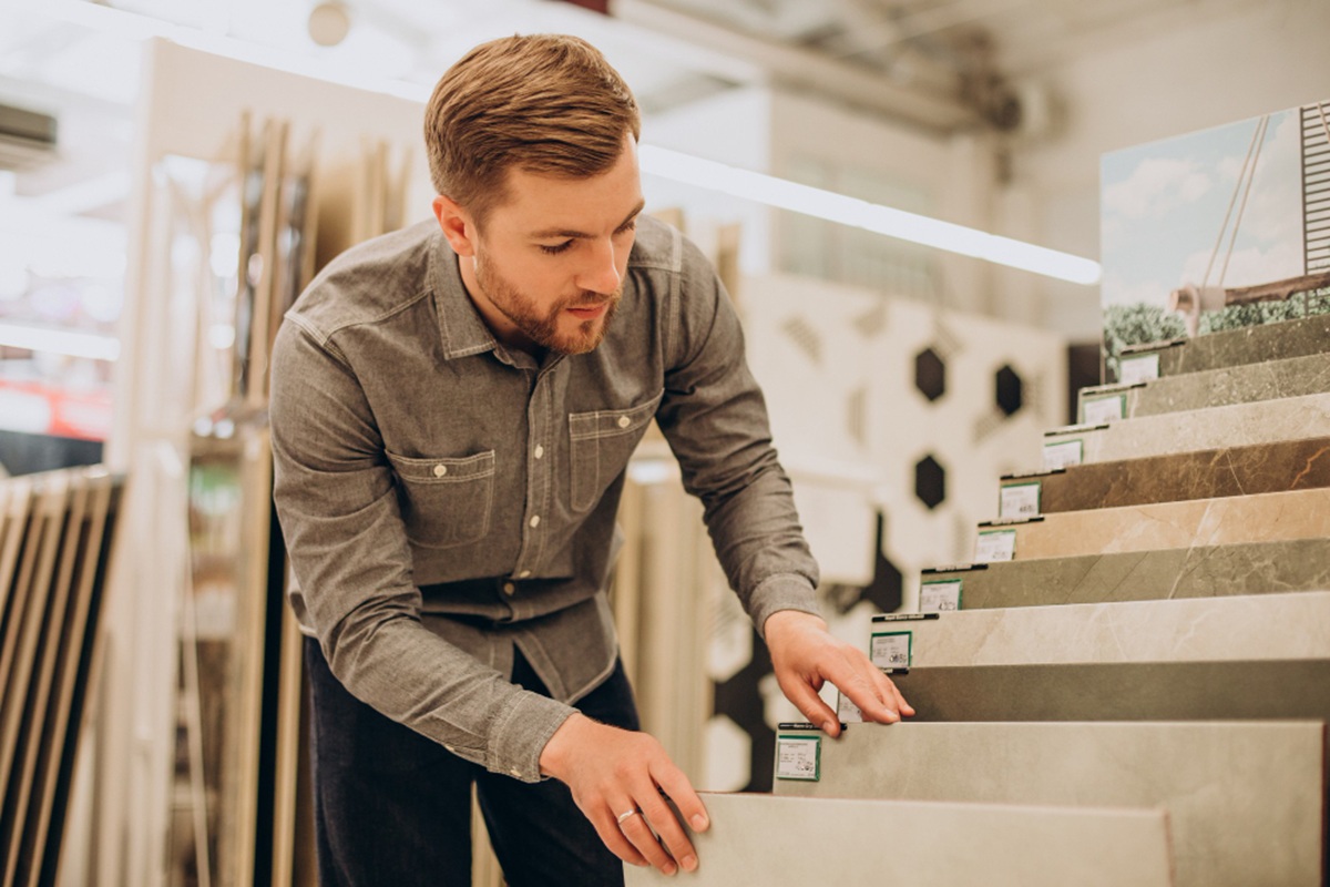 person choosing tiles